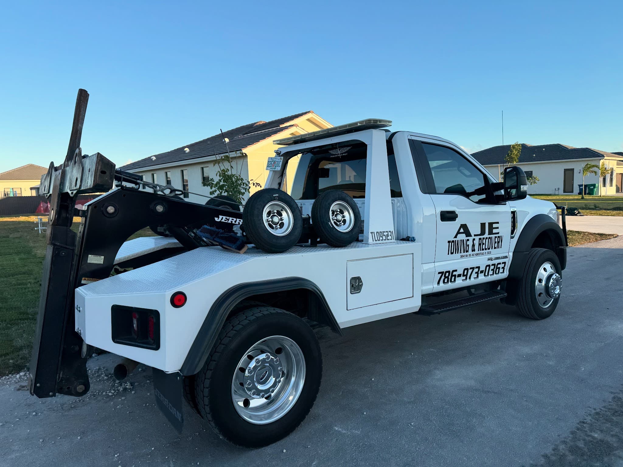 AJE Towing & Recovery truck on the job in South Florida