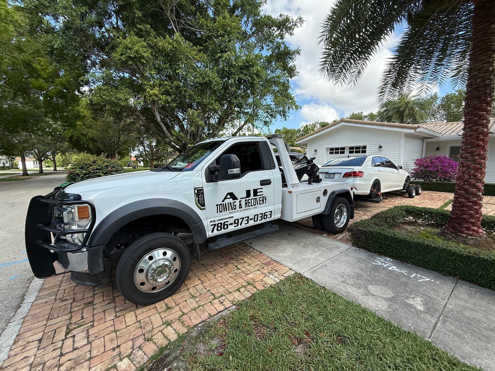 AJE Towing & Recovery flatbed wrecker serving South Florida